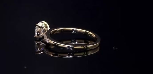 Solitario 1 ct a 4 griffes 18 kt